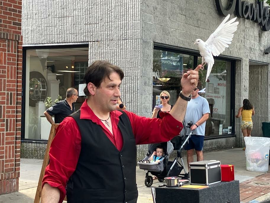 Alexo, a magician from Team Fun Entertainment, made a dove appear during his magic show.